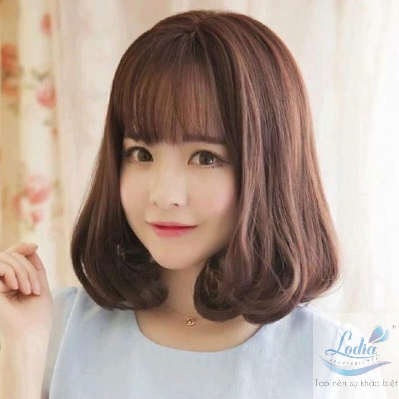 Kiểu tóc uốn xoăn nhẹ cho tóc ngắn